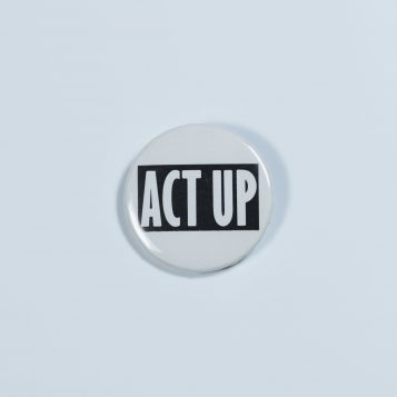 Button reading "ACT UP," referring to the ACT UP organization